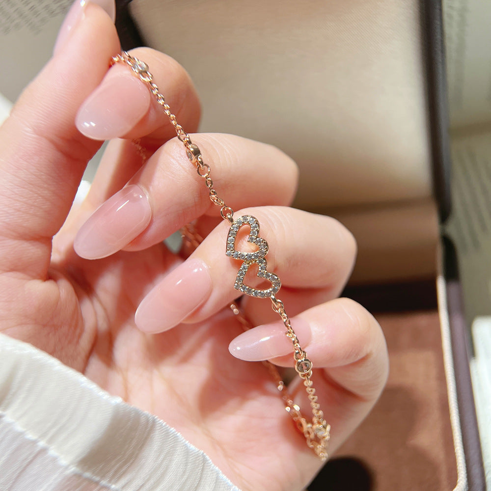Double Heart Elaborate Copper Bracelet For Women With Electroplated Gold Plating And Zircon Inlay