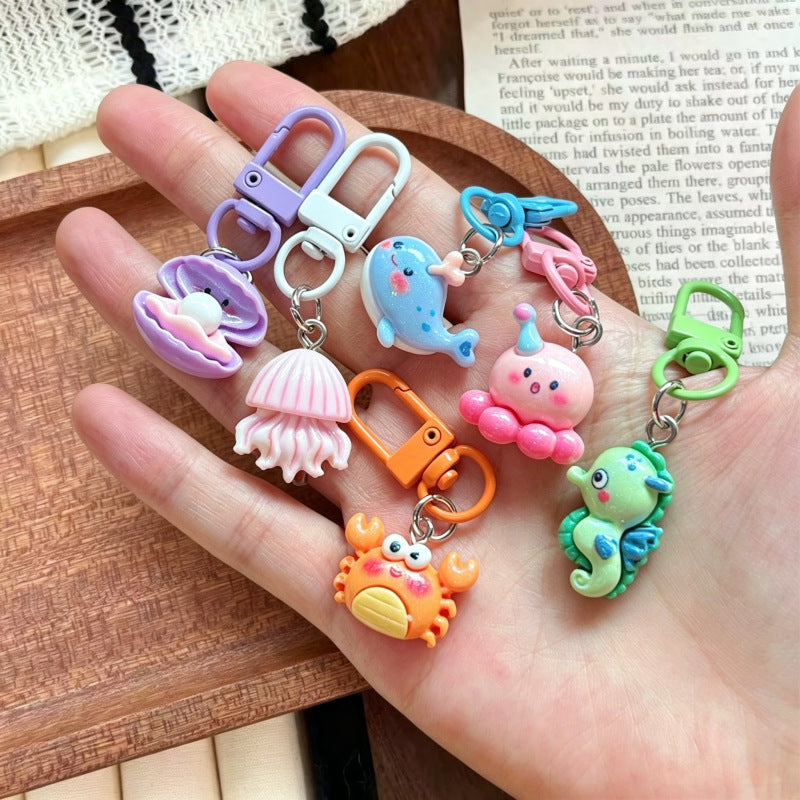 Multicolor Cartoon Pearl Key Chain In Plastic With Original Design, Featuring Shell Inlay For Unique Charm