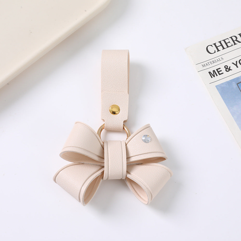 Cute Bow Tie Key Chain Made Of PU Leather Featuring A Charming Design