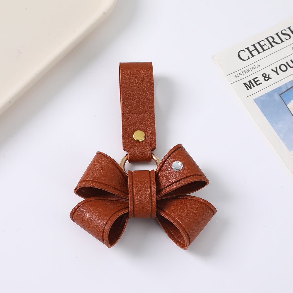 Cute Bow Tie Key Chain Made Of PU Leather Featuring A Charming Design