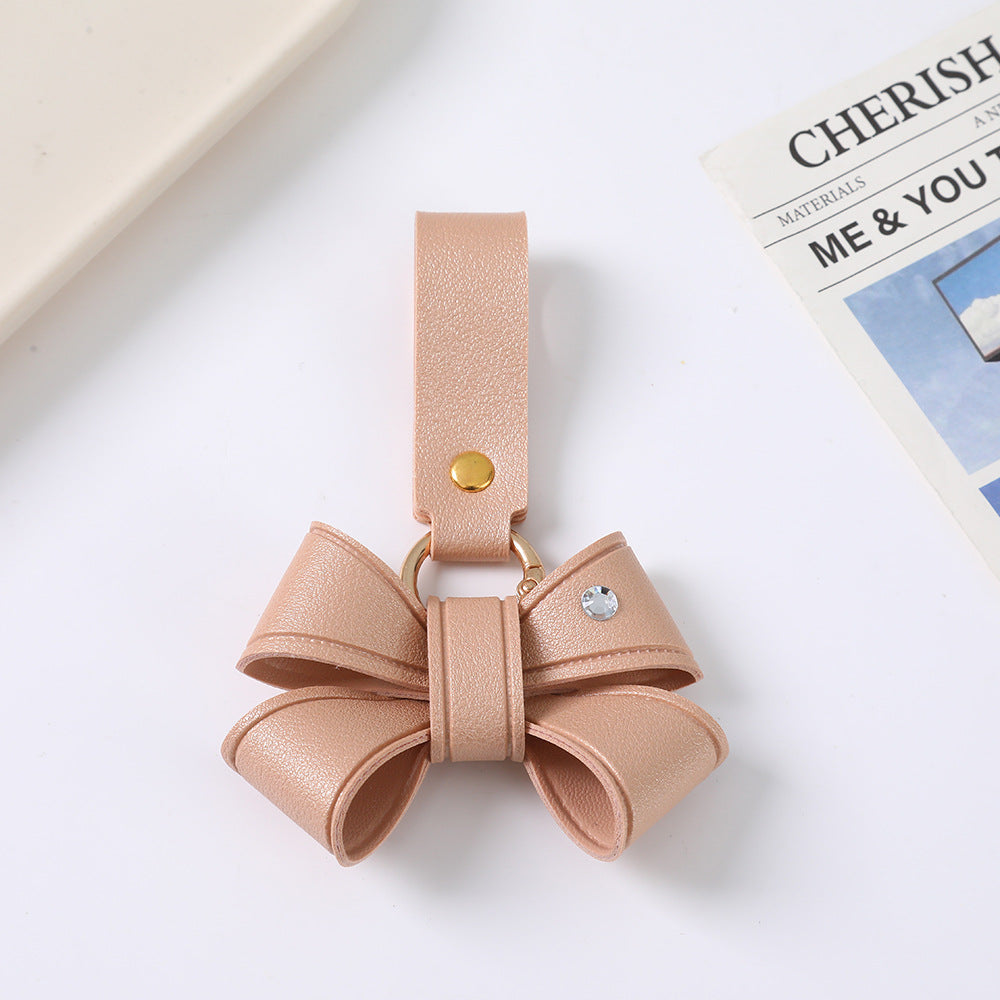 Cute Bow Tie Key Chain Made Of PU Leather Featuring A Charming Design