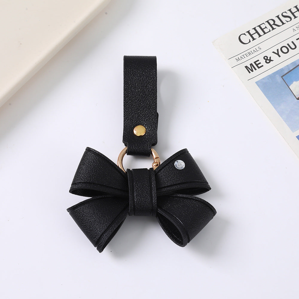 Cute Bow Tie Key Chain Made Of PU Leather Featuring A Charming Design