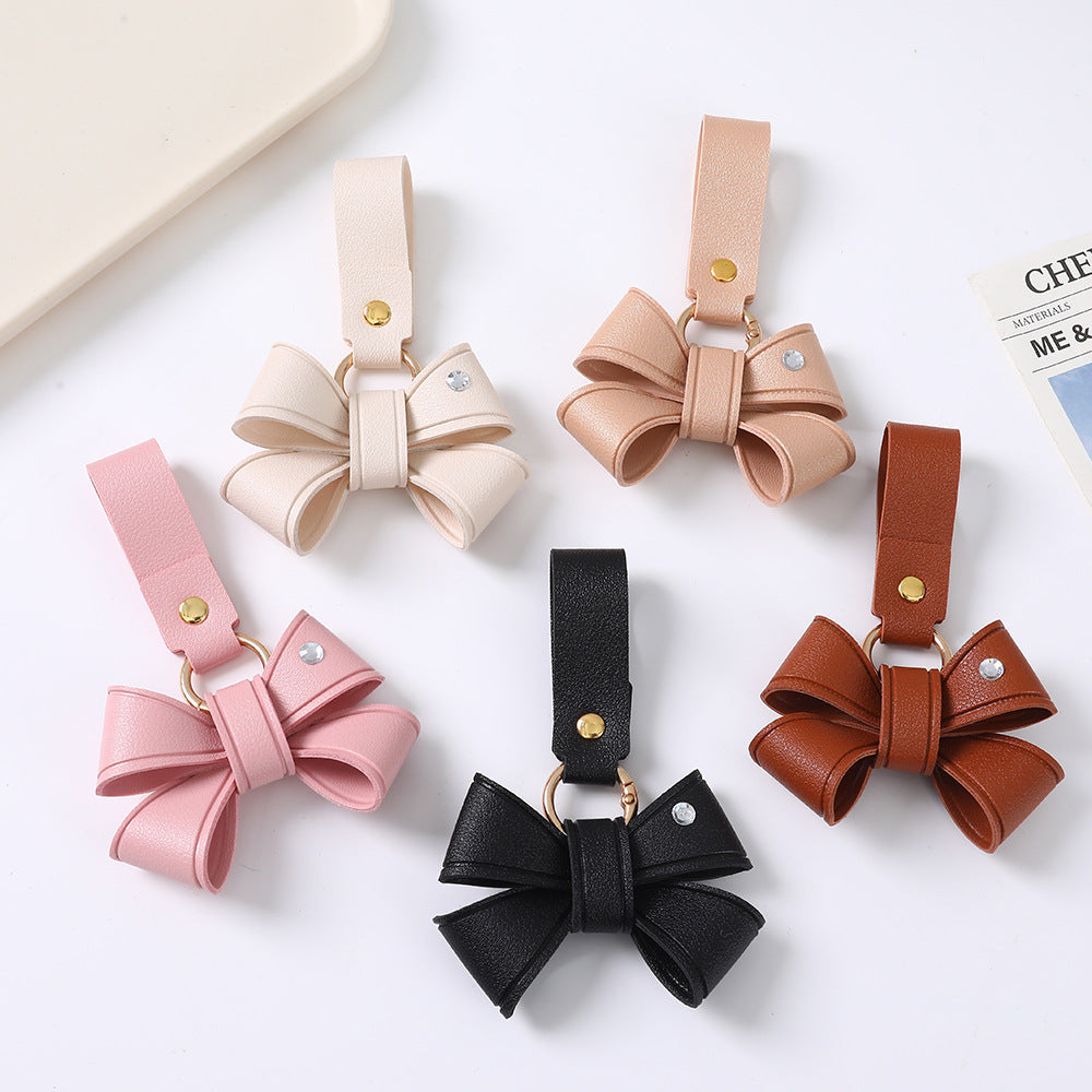 Cute Bow Tie Key Chain Made Of PU Leather Featuring A Charming Design
