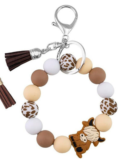 Leopard Print Tassel Key Chain In Khaki Featuring Silica Gel Material, Perfect For Winter Accessories