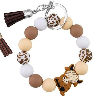 Leopard Print Tassel Key Chain In Khaki Featuring Silica Gel Material, Perfect For Winter Accessories