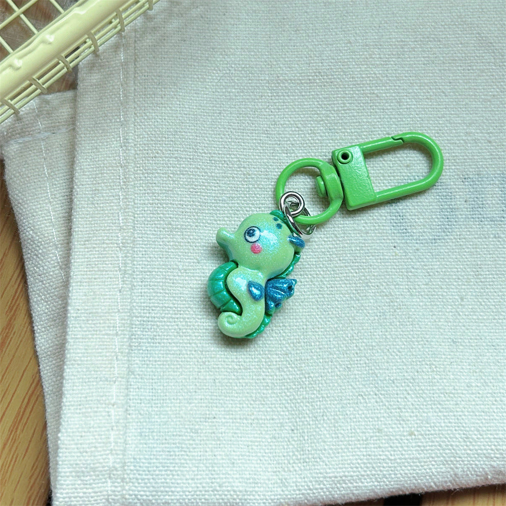 Multicolor Cartoon Pearl Key Chain In Plastic With Original Design, Featuring Shell Inlay For Unique Charm