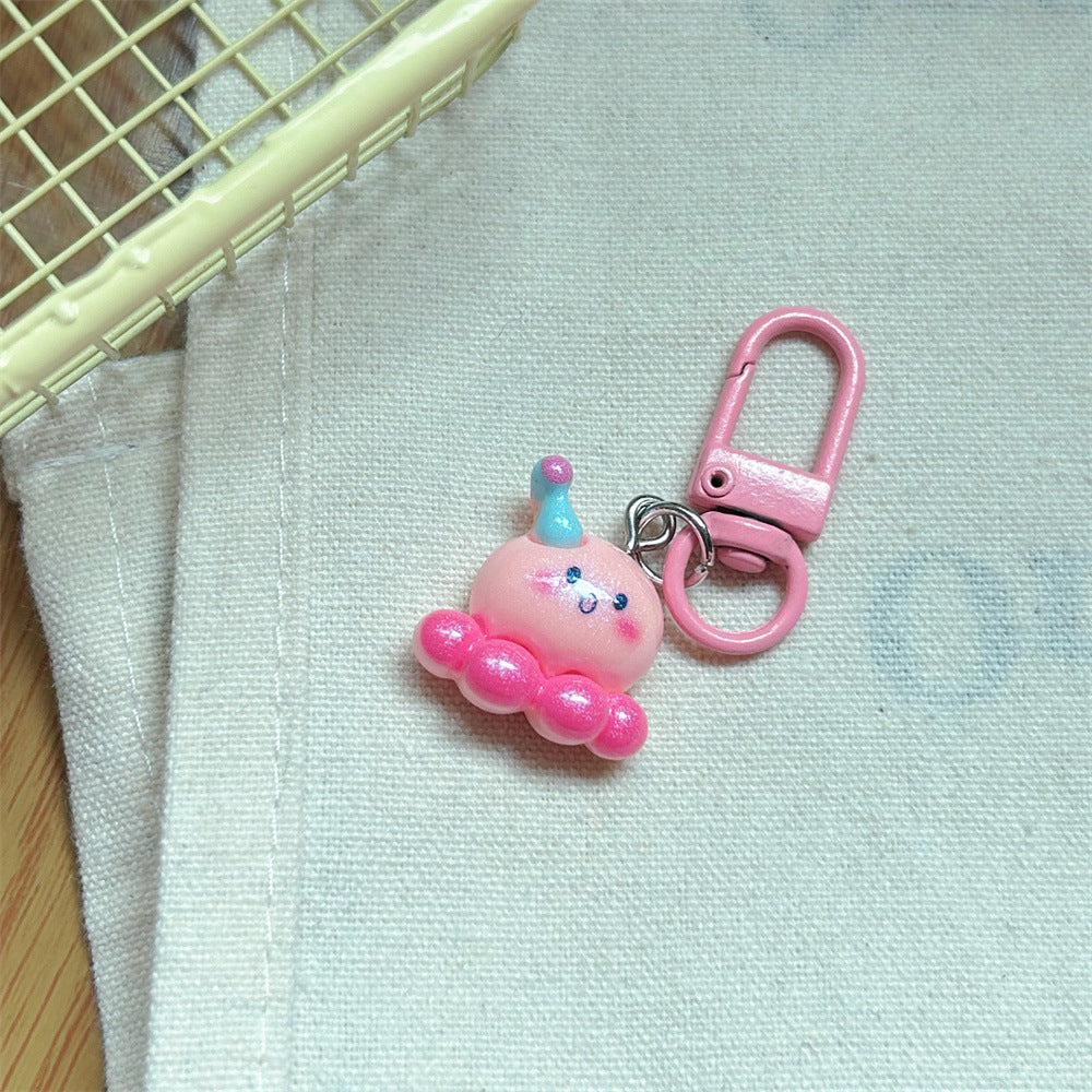 Multicolor Cartoon Pearl Key Chain In Plastic With Original Design, Featuring Shell Inlay For Unique Charm