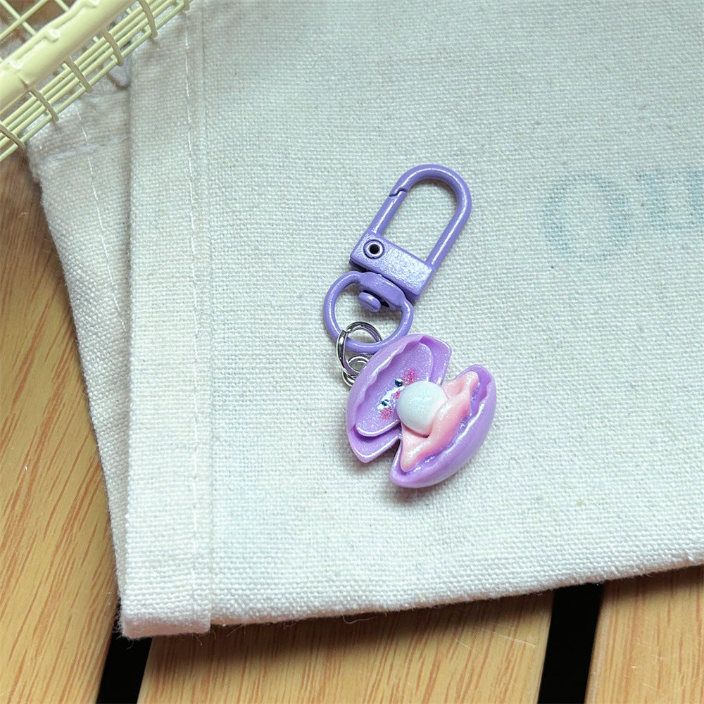 Multicolor Cartoon Pearl Key Chain In Plastic With Original Design, Featuring Shell Inlay For Unique Charm