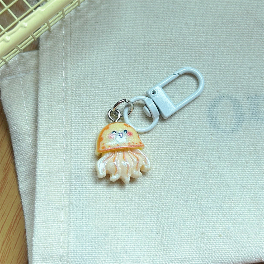 Multicolor Cartoon Pearl Key Chain In Plastic With Original Design, Featuring Shell Inlay For Unique Charm