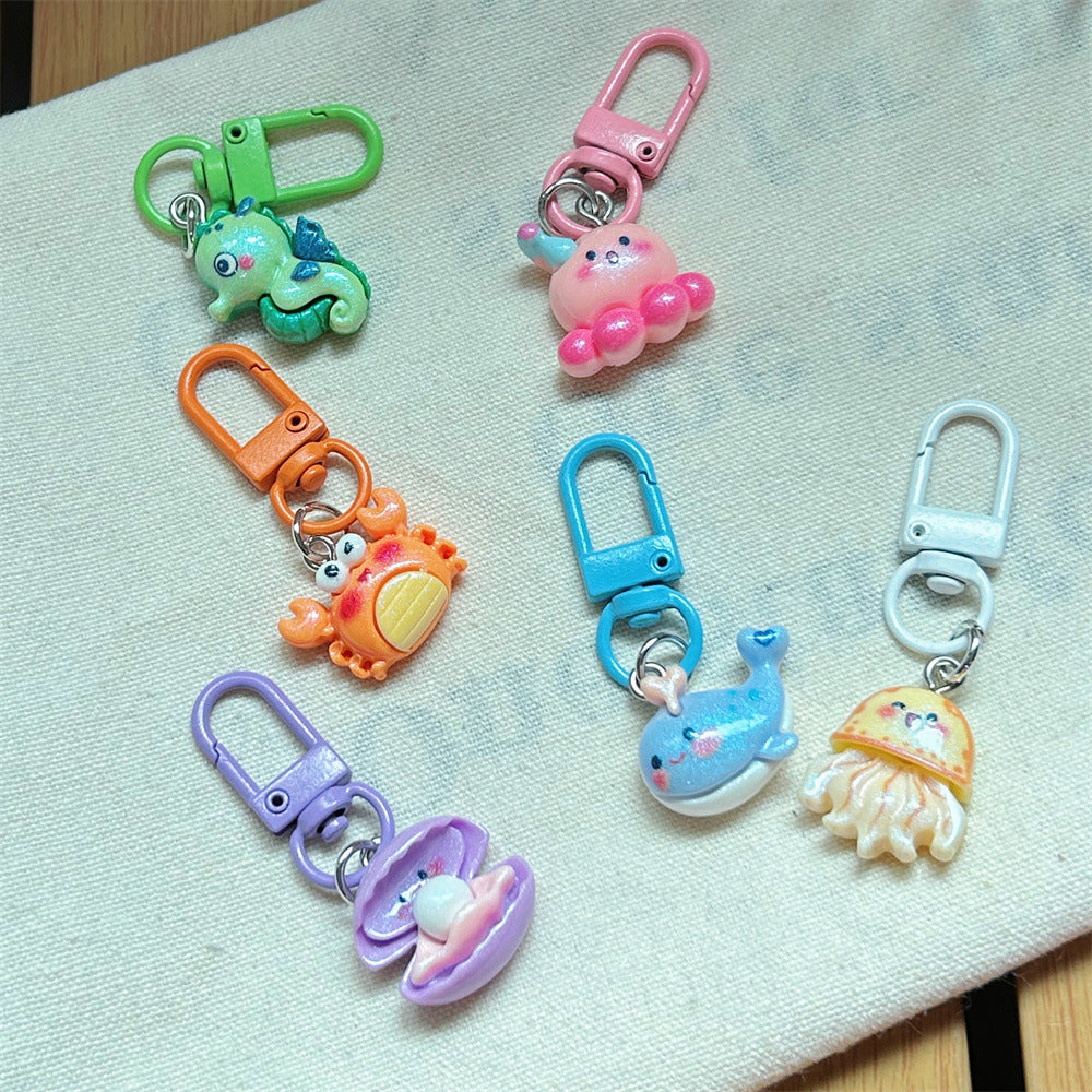 Multicolor Cartoon Pearl Key Chain In Plastic With Original Design, Featuring Shell Inlay For Unique Charm