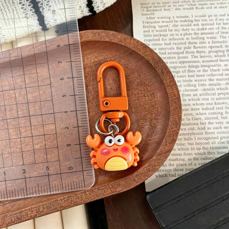 Multicolor Cartoon Pearl Key Chain In Plastic With Original Design, Featuring Shell Inlay For Unique Charm