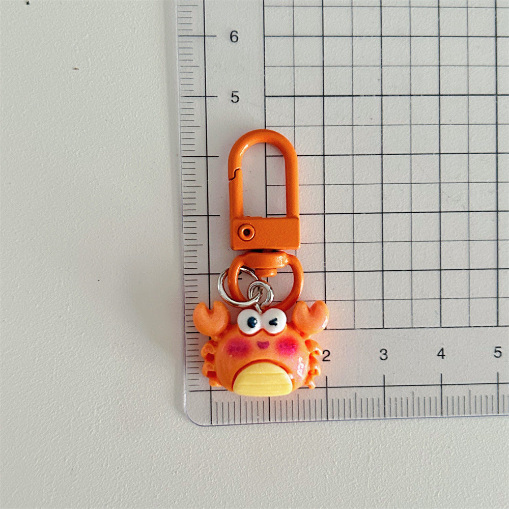 Multicolor Cartoon Pearl Key Chain In Plastic With Original Design, Featuring Shell Inlay For Unique Charm