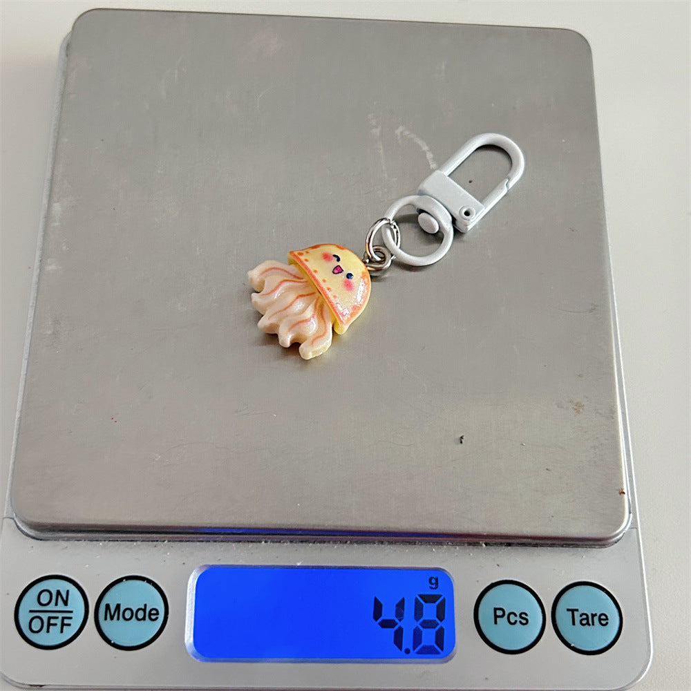 Multicolor Cartoon Pearl Key Chain In Plastic With Original Design, Featuring Shell Inlay For Unique Charm