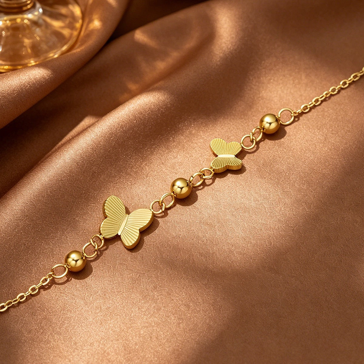 Handmade Butterfly Bracelet In  Style With PVD Coated Titanium Steel And Titanium Plating On Cable Chain