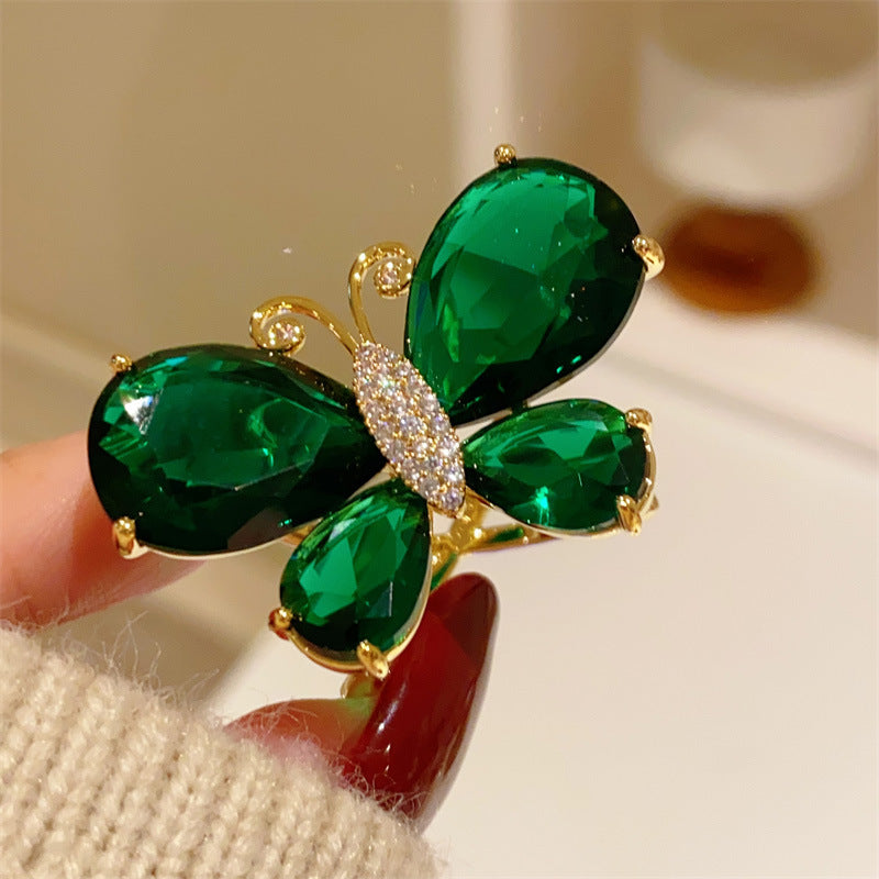 Butterfly Scarf Ring For Women In Copper Featuring May Birthstone Emerald Accent