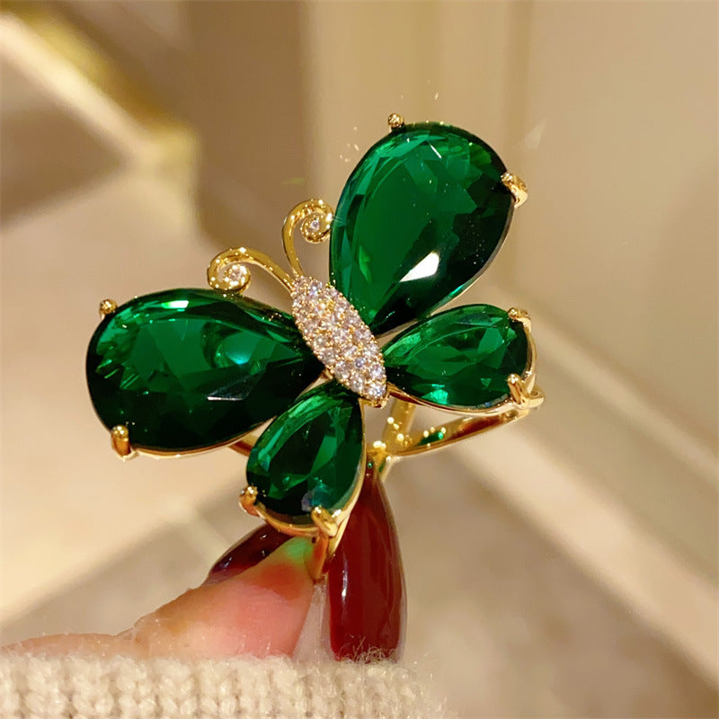 Butterfly Scarf Ring For Women In Copper Featuring May Birthstone Emerald Accent