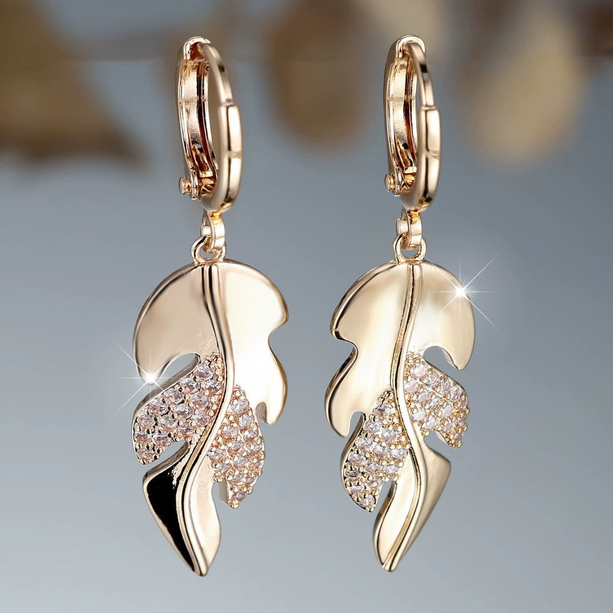 Leaves Dangling Earrings For Women With Copper Studs, Bezel Setting And Electroplated Gold Plating Featuring Rhinestones