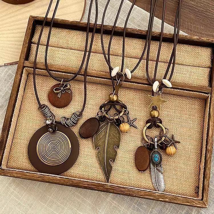 Bohemian Feather Sweater Chain Necklace For Women With Electroplated Bronze Plating And Alloy Pendant
