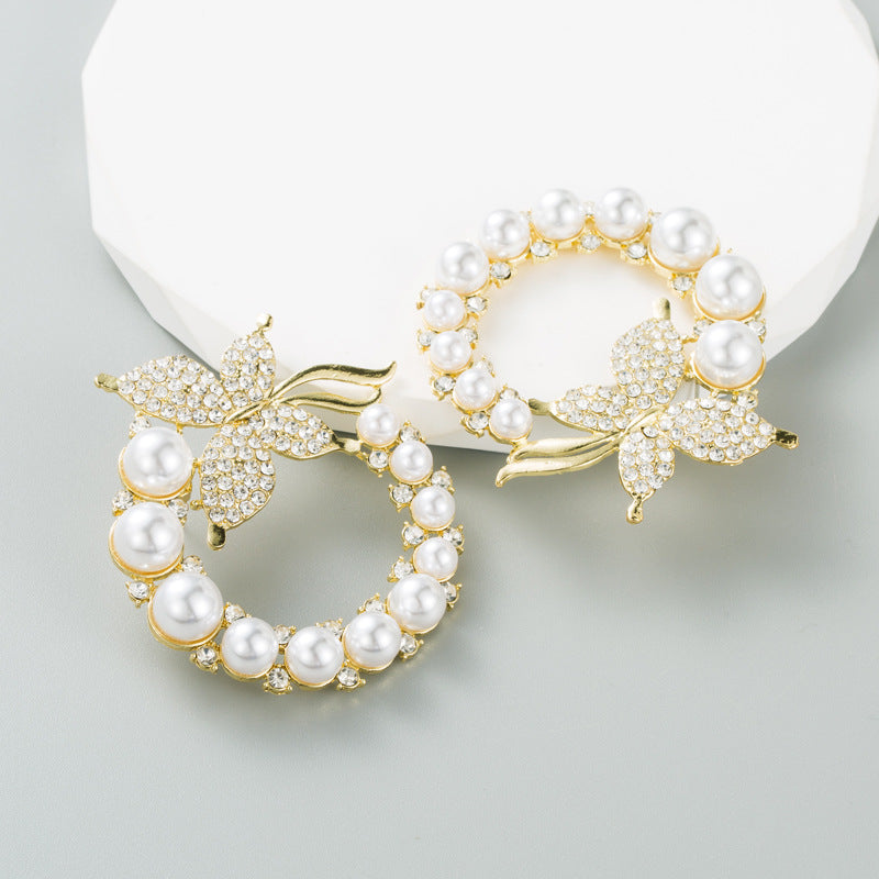 Gold Electroplated Alloy Earrings For Women Featuring Elegant Design