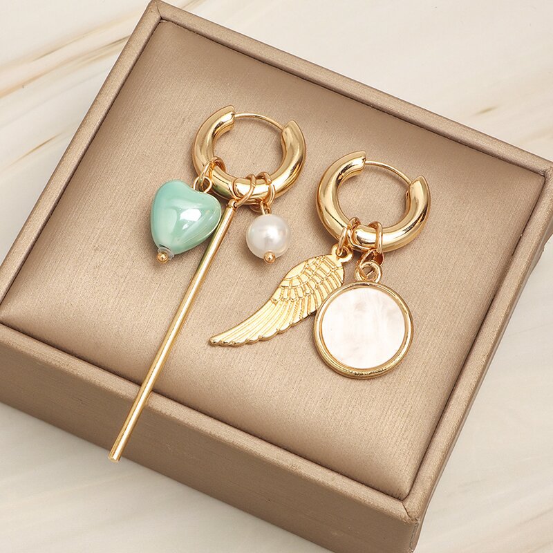 Heart Shape Asymmetrical Gold Drop Earrings For Women Featuring Ceramic Material With Copper Ear Pins