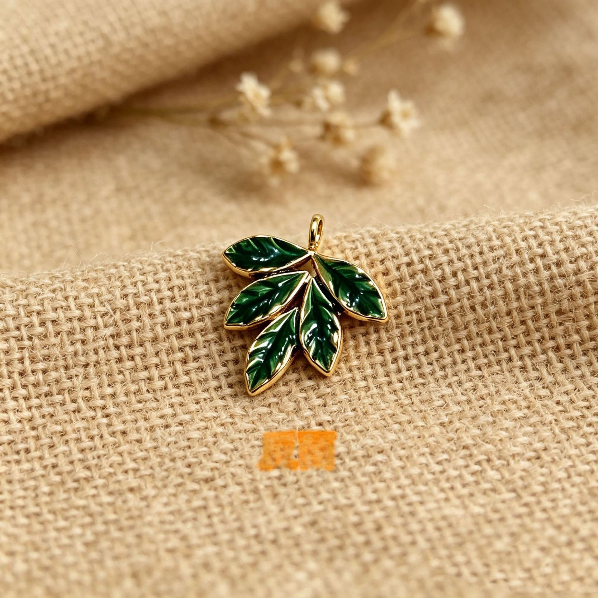 Maple Leaf Pendant In 304 Stainless Steel With PVD Coated Gold Plating Process, Featuring Enamel And Electroplated Green Finish