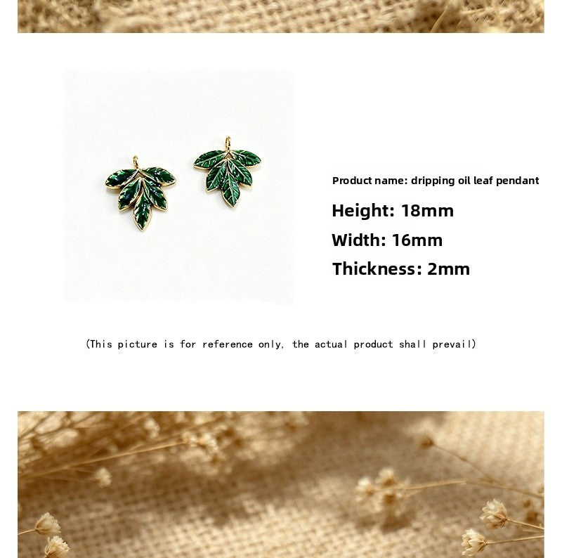 Maple Leaf Pendant In 304 Stainless Steel With PVD Coated Gold Plating Process, Featuring Enamel And Electroplated Green Finish