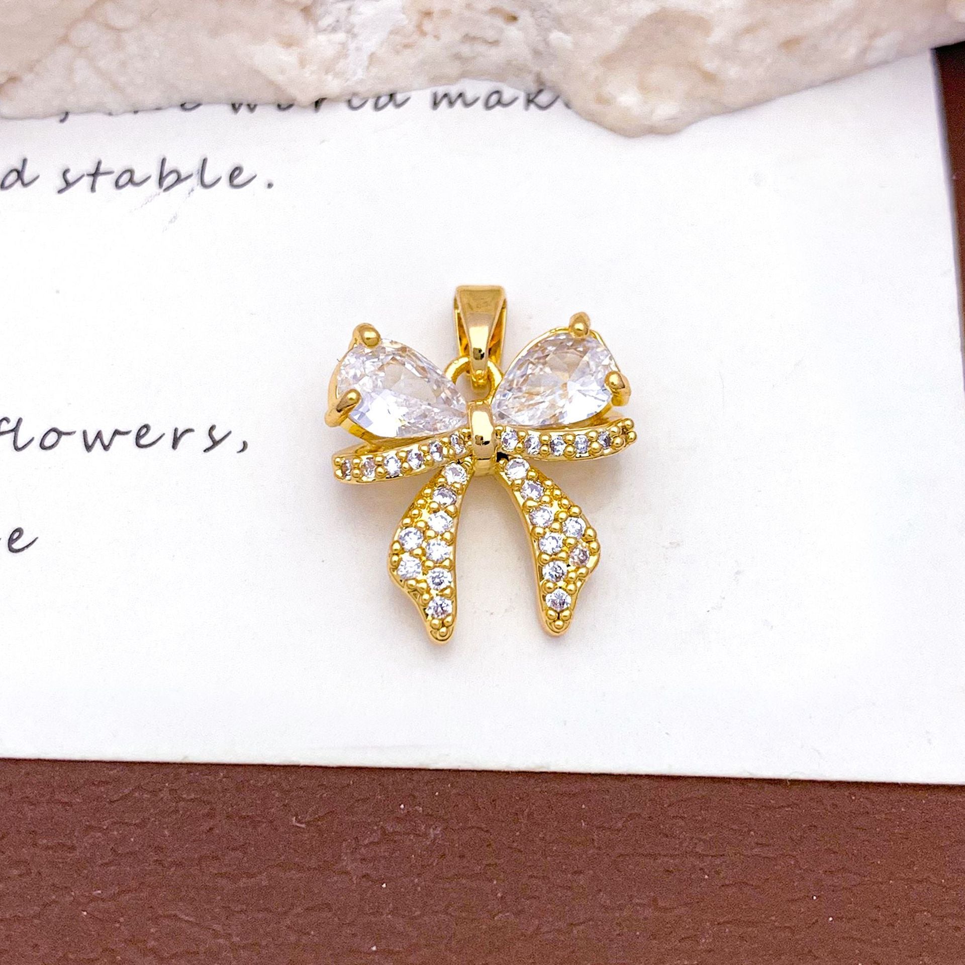 Bow Tie Pendant For Women With Electroplated Gold Plating And Tassel Design In Copper, Ideal For Winter