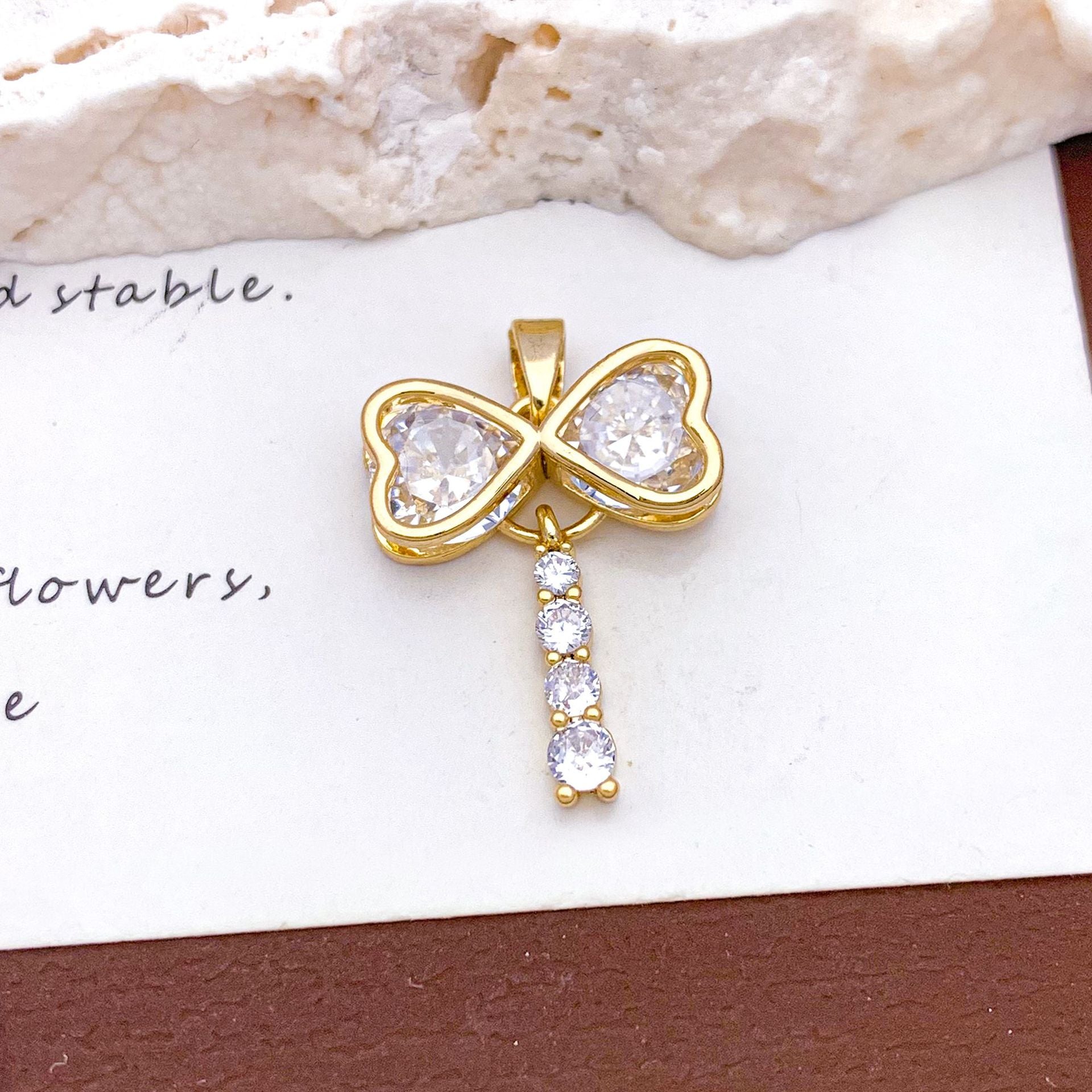 Bow Tie Pendant For Women With Electroplated Gold Plating And Tassel Design In Copper, Ideal For Winter