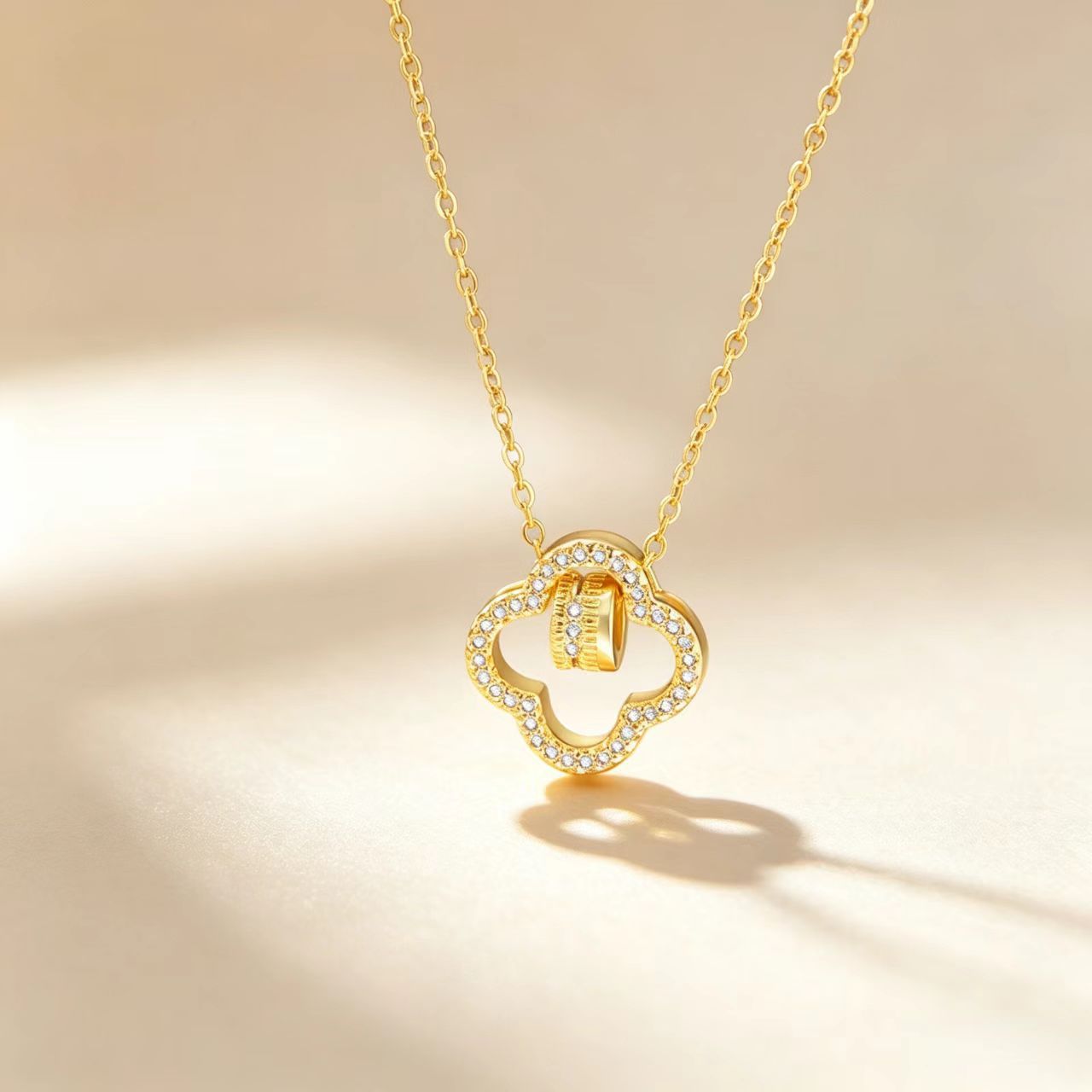 Golden Plated Leaf Pendant Necklace For Women In Titanium Steel With Zircon Inlay And Cable Chain