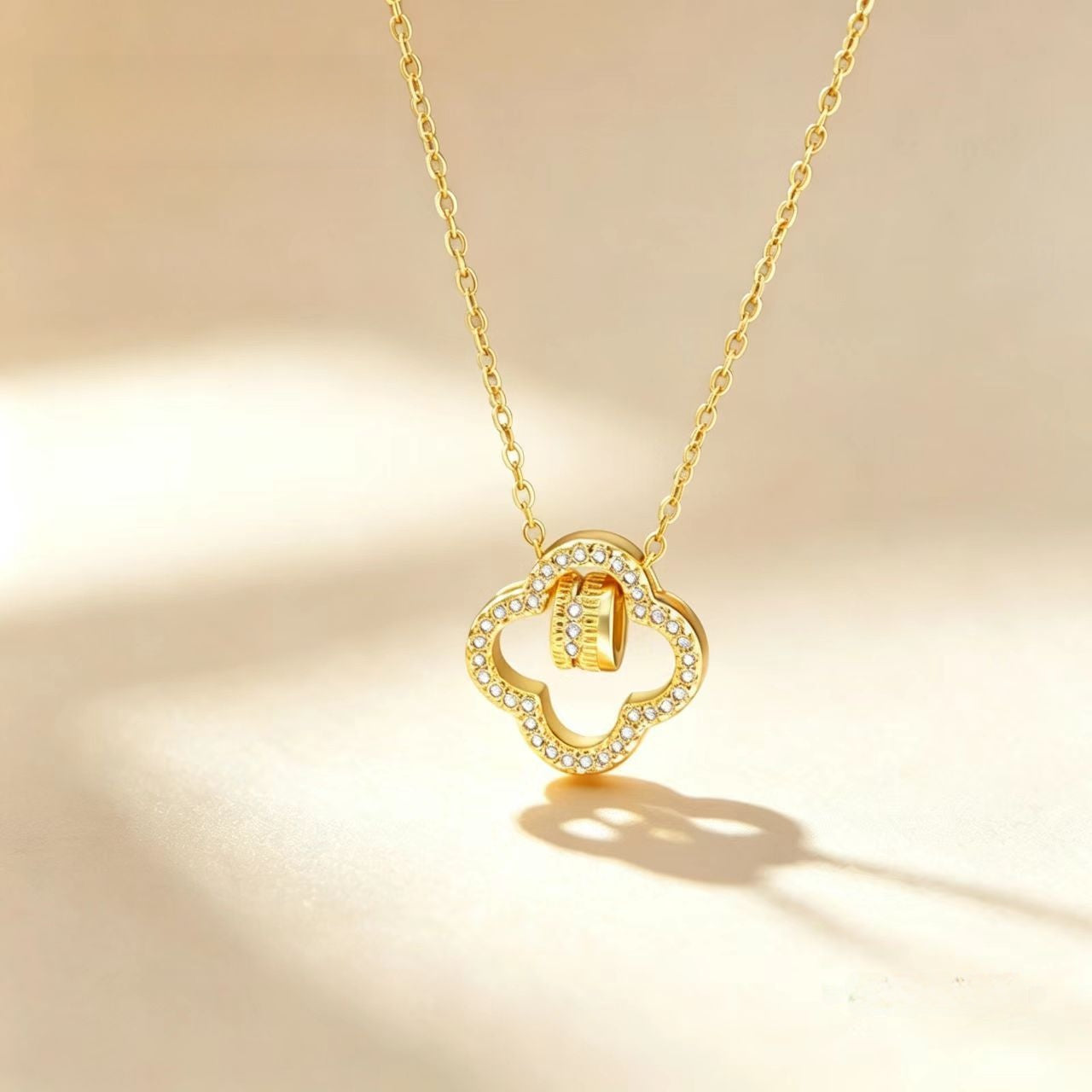 Golden Plated Leaf Pendant Necklace For Women In Titanium Steel With Zircon Inlay And Cable Chain