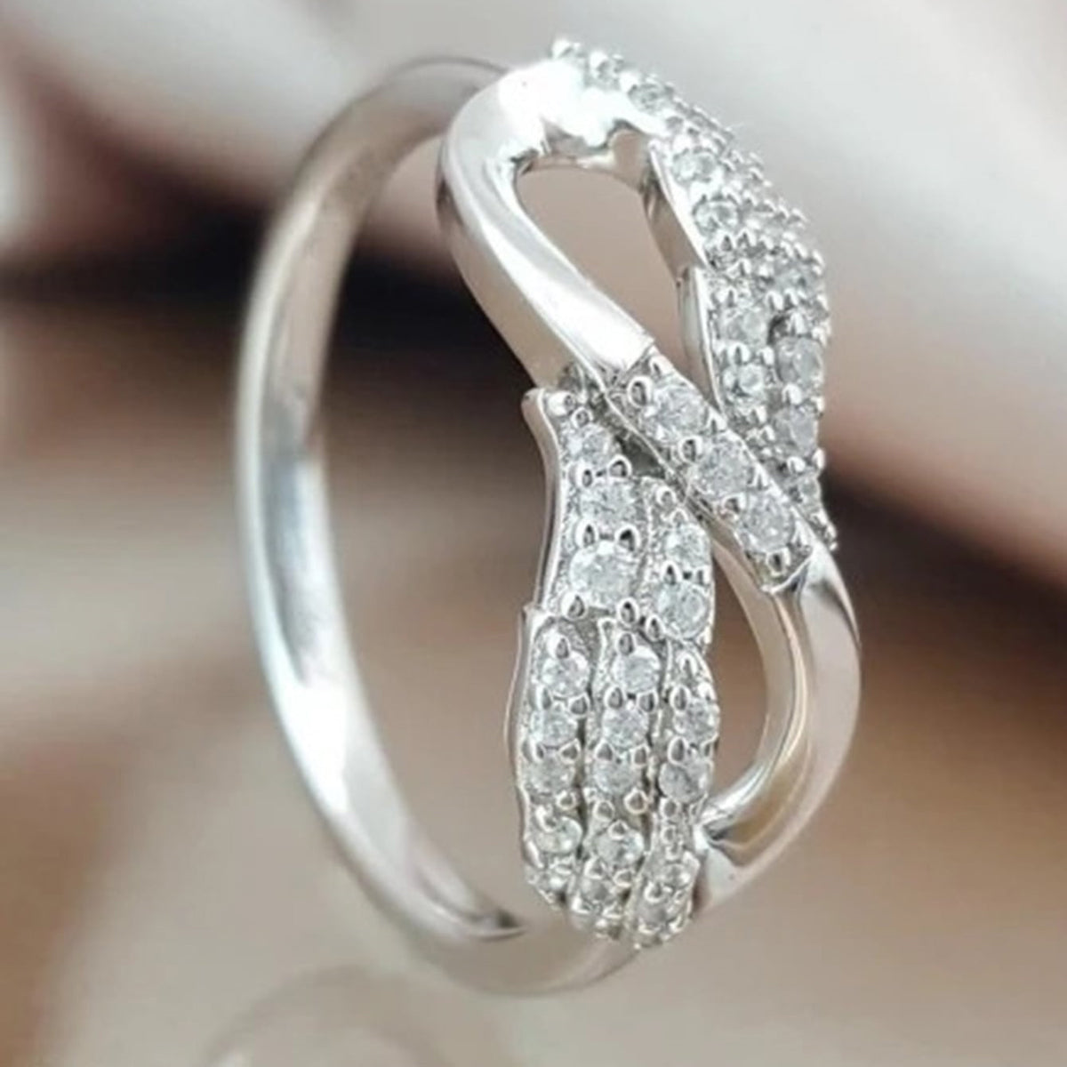 Infinity Claw Setting Ring For Women In Copper With White K Water Plating And Zircon Inlay