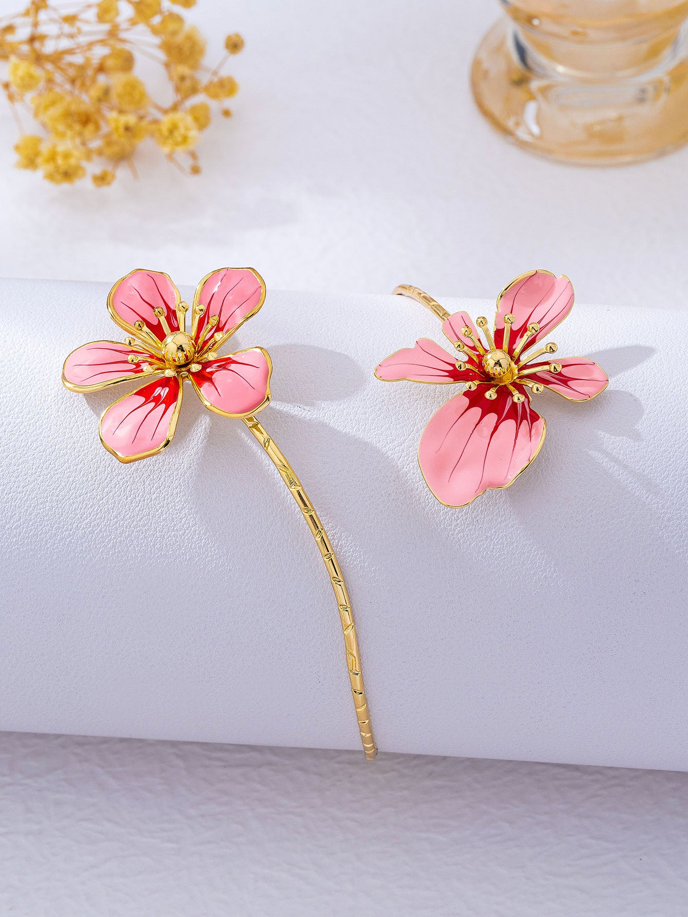 Elegant Asymmetrical Flowers Arm Bracelet For Women In Natural Pink Alloy With KC Golden Plated Finish