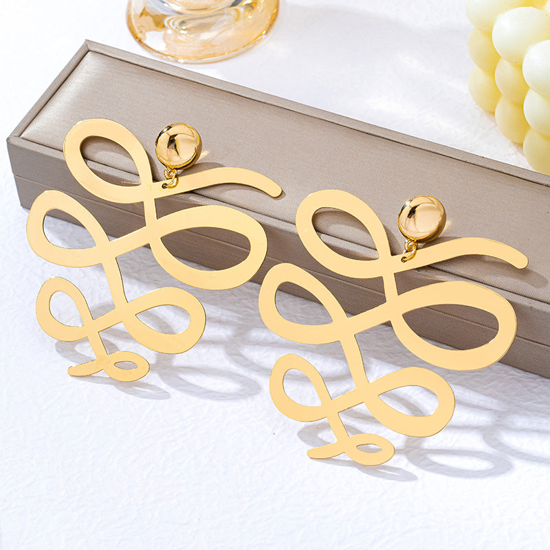 Exaggerated Irregular Hollow Out Stud Earrings For Women In KC Golden Plated Alloy