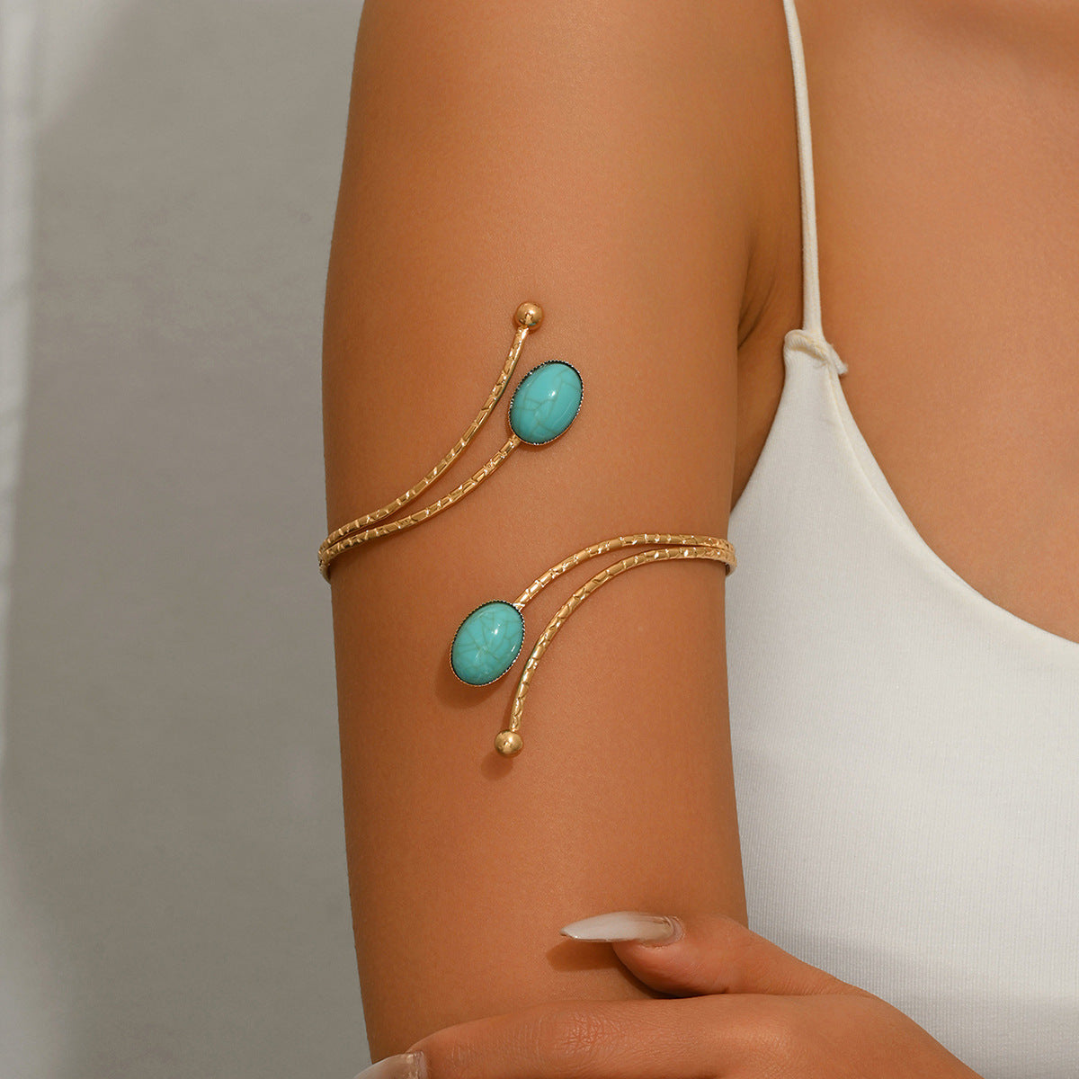 Exaggerated Oval Gold Arm Cuff Bangle In Electroplated Metal Featuring Turquoise Inlay