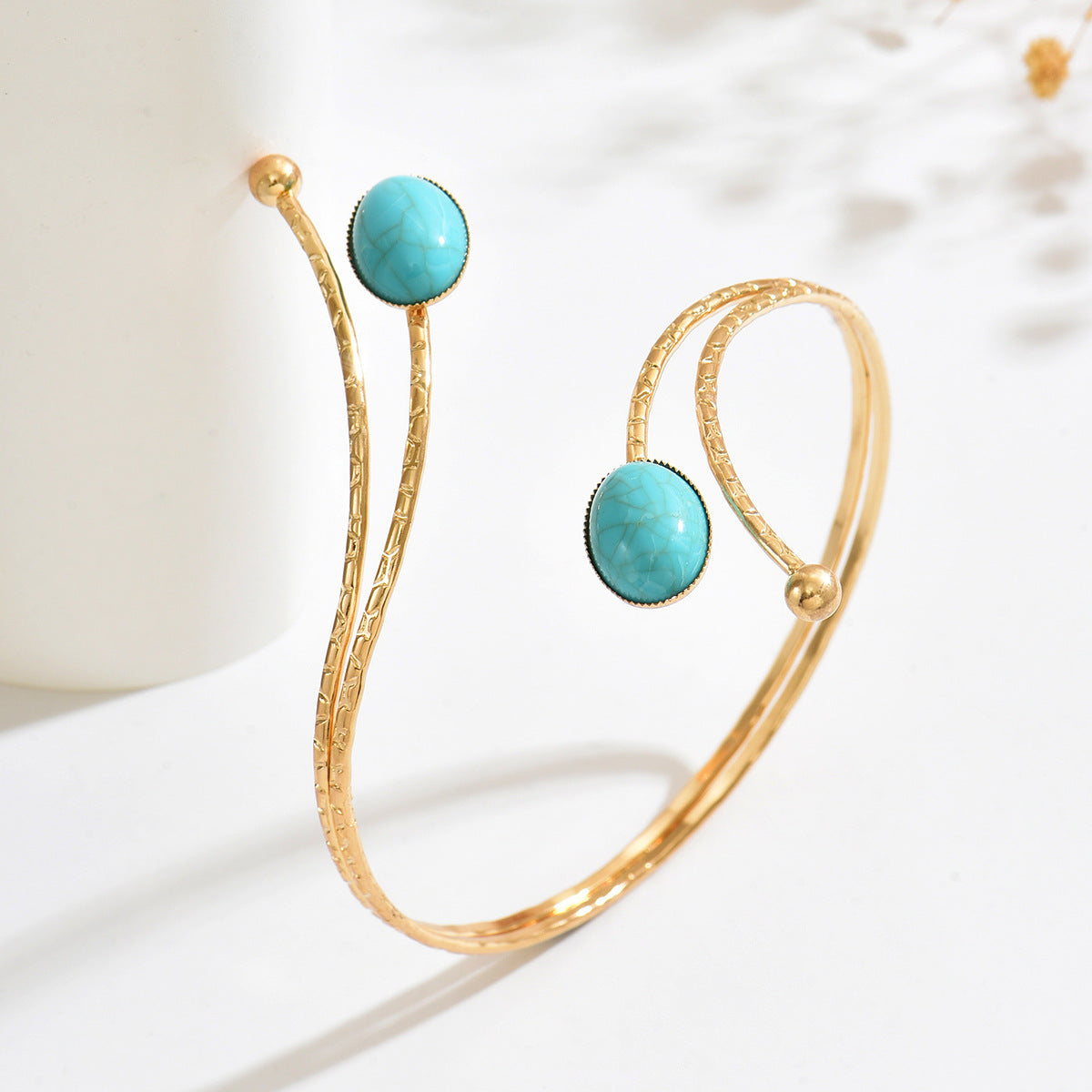 Exaggerated Oval Gold Arm Cuff Bangle In Electroplated Metal Featuring Turquoise Inlay