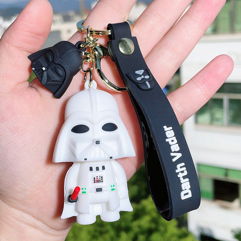 Human Pattern Key Chain In Dyed Black Featuring Durable PVC Material