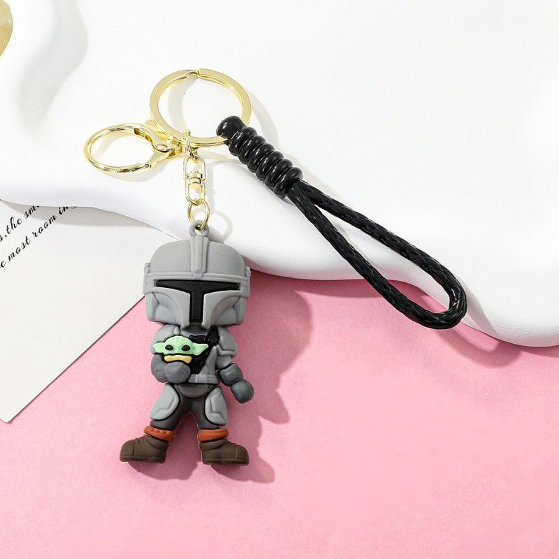 Human Pattern Key Chain In Dyed Black Featuring Durable PVC Material