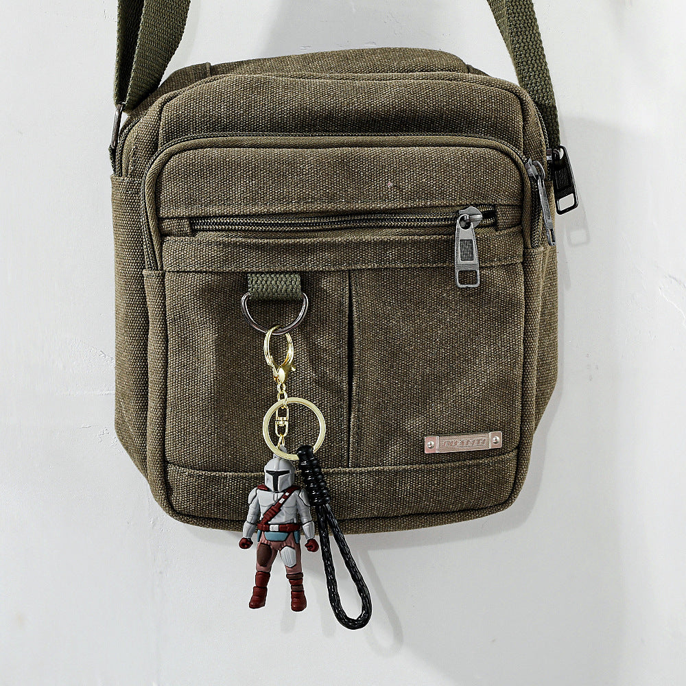 Human Pattern Key Chain In Dyed Black Featuring Durable PVC Material