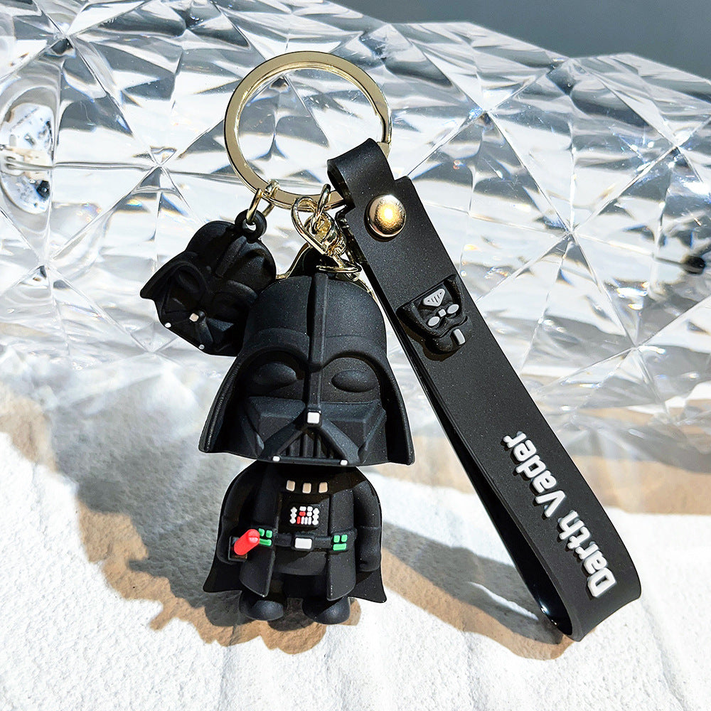 Human Pattern Key Chain In Dyed Black Featuring Durable PVC Material