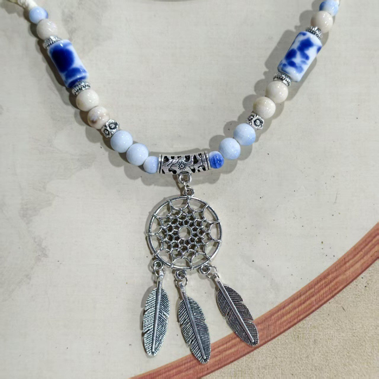 Ethnic Style Unisex Butterfly Braid Sweater Chain Necklace Featuring Ceramic Pendant With Woven Chain