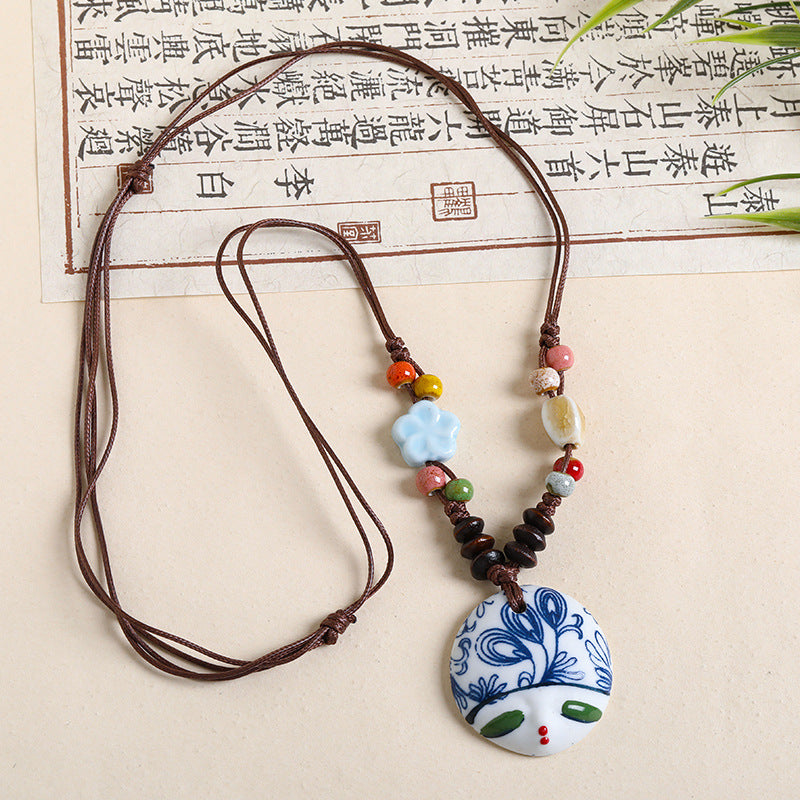 Ethnic Style Unisex Butterfly Braid Sweater Chain Necklace Featuring Ceramic Pendant With Woven Chain
