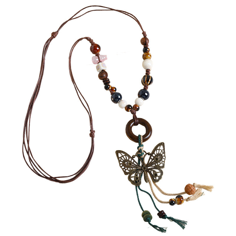 Ethnic Style Unisex Butterfly Braid Sweater Chain Necklace Featuring Ceramic Pendant With Woven Chain