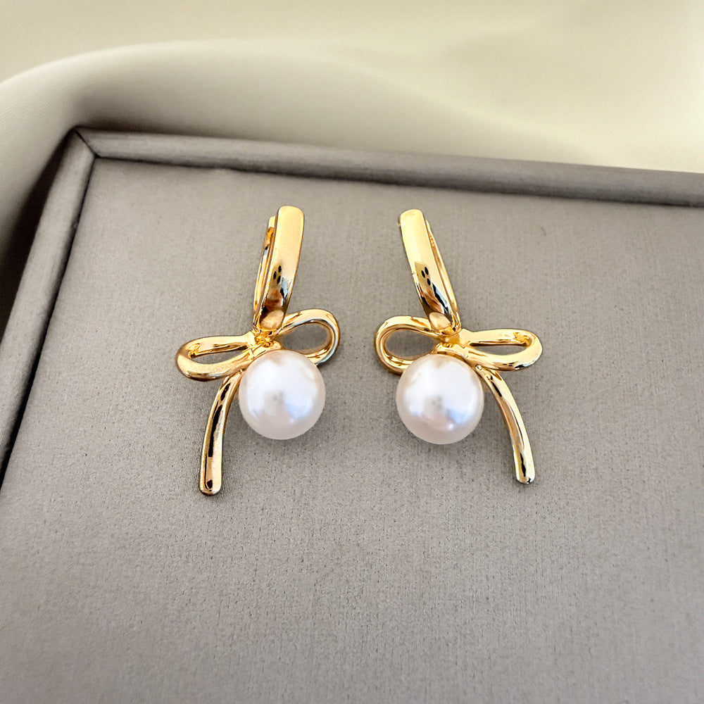 Elegant Bow Tie Earrings For Women In Electroplated Copper With Artificial Pearl Inlay