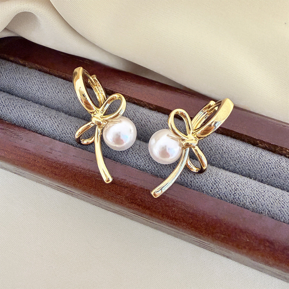 Elegant Bow Tie Earrings For Women In Electroplated Copper With Artificial Pearl Inlay