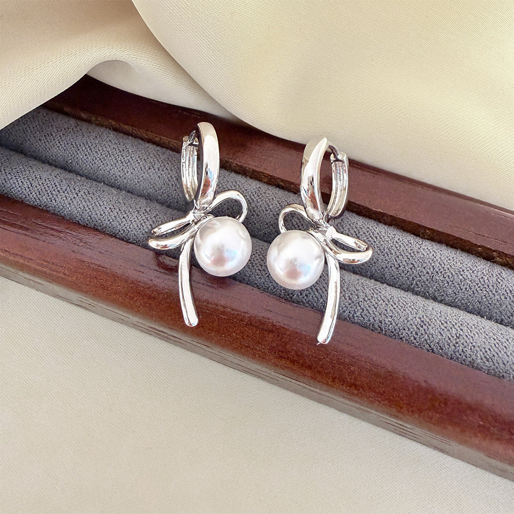 Elegant Bow Tie Earrings For Women In Electroplated Copper With Artificial Pearl Inlay