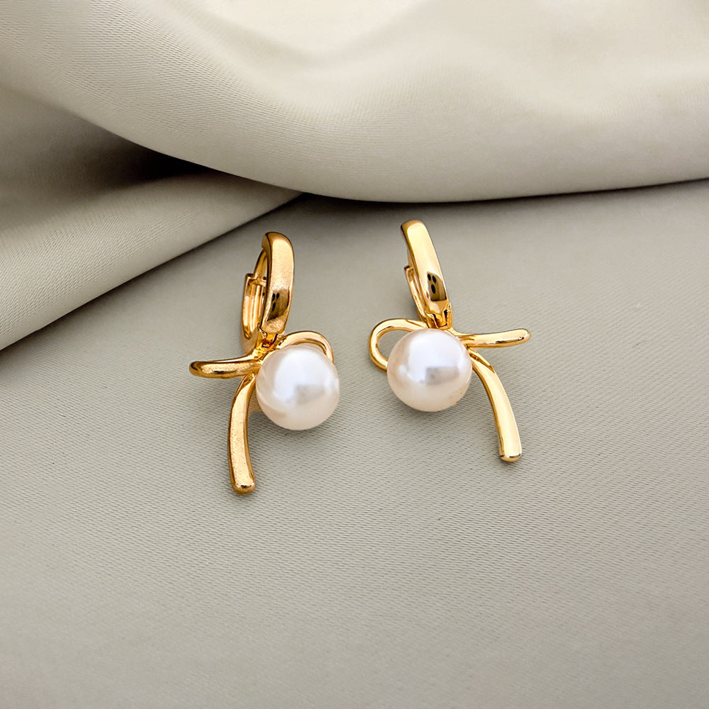 Elegant Bow Tie Earrings For Women In Electroplated Copper With Artificial Pearl Inlay