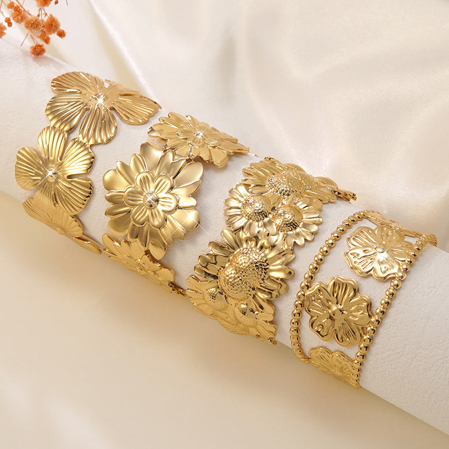 Electroplated Flowers Bangle For Women In 304 Stainless Steel With Golden Plated Finish And 0.03µm Coating Thickness