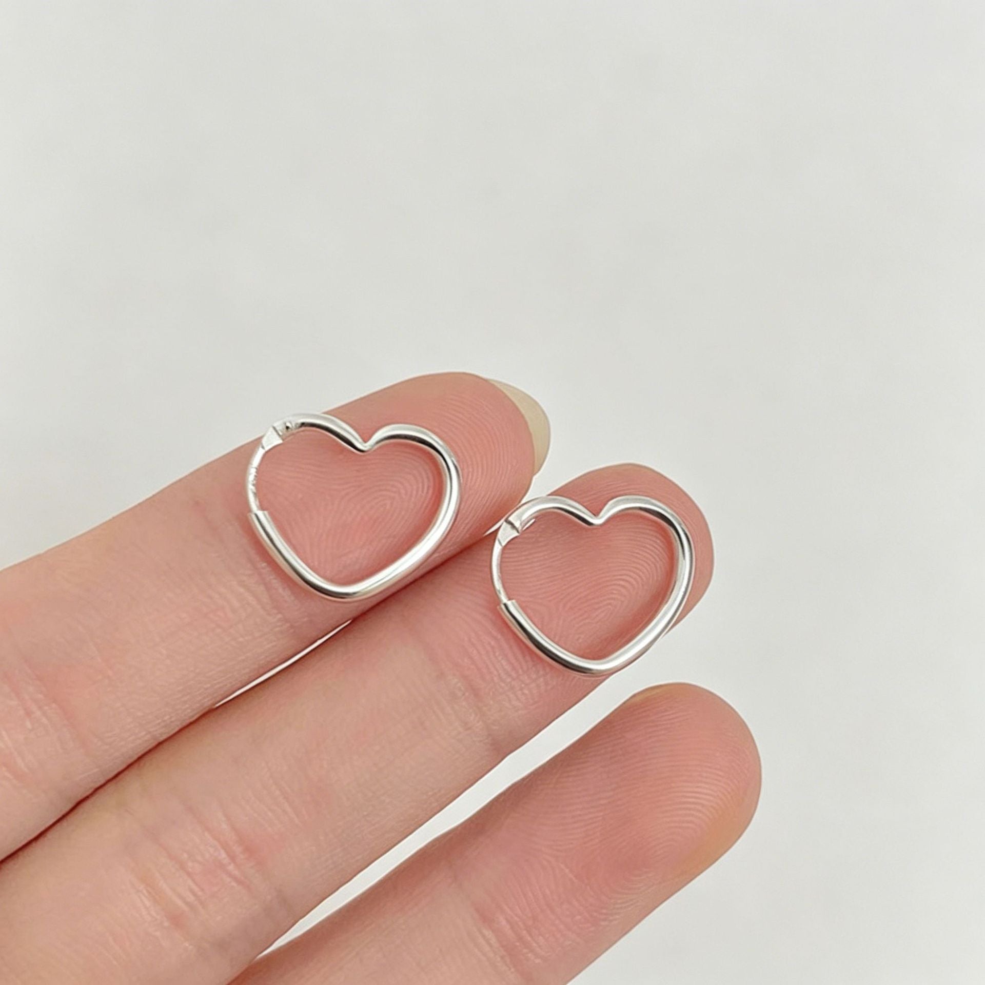 Heart Shape Hoop Earrings In 925 Sterling Silver Featuring 925 Sterling Silver Stud Posts