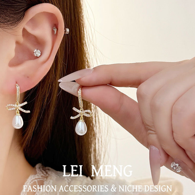 Gold Bow Tie Drop Earrings For Women With Copper Ear Pins And Artificial Pearl Inlay
