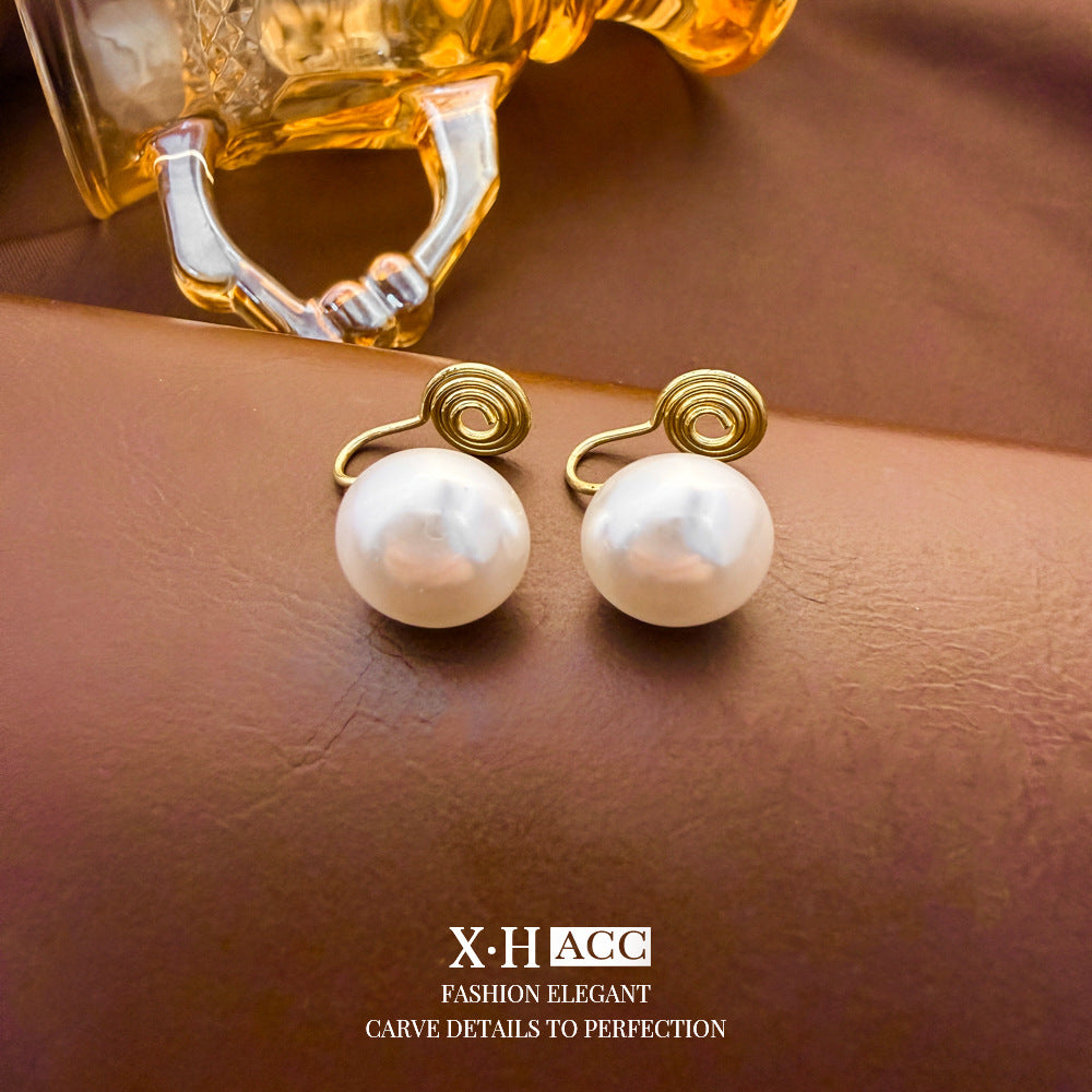 Elegant Heart Shape Clip Earrings For Women In Gold Alloy With Electroplated Finish And Artificial Pearl Inlay